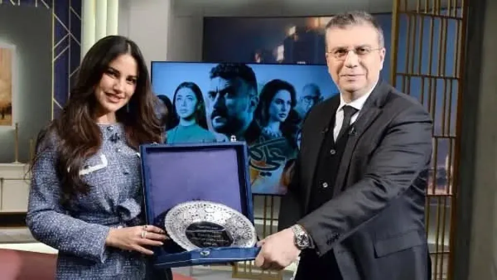 الإعلامي عمرو الليثي ودرة 