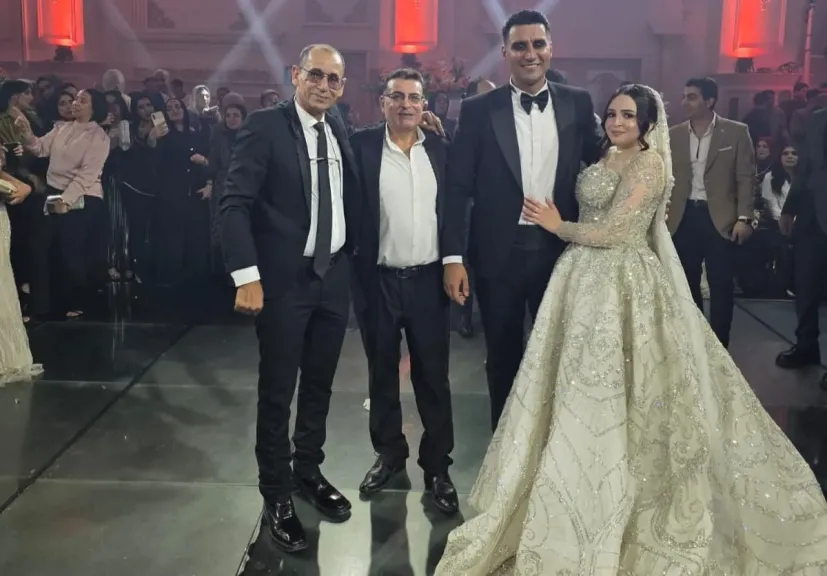 العروس دكتورة منى والعريس النقيب دكتور محمود الزهيري 